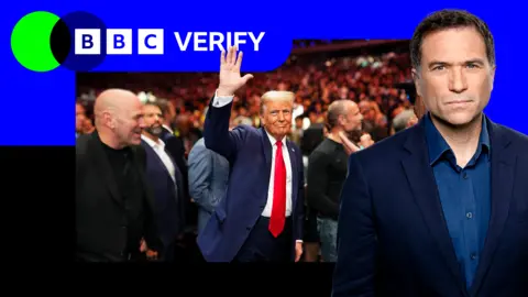 President Trump waving at a crowded event