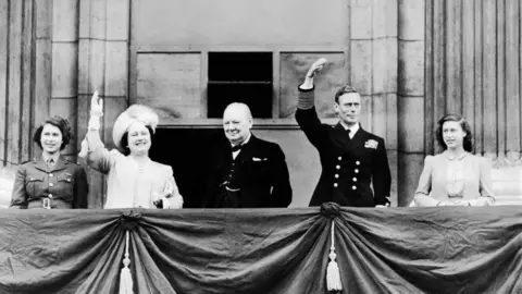 Getty Images The then-Princess Elizabeth with Queen Elizabeth, Winston Churchill, King George VI and Princess Margaret