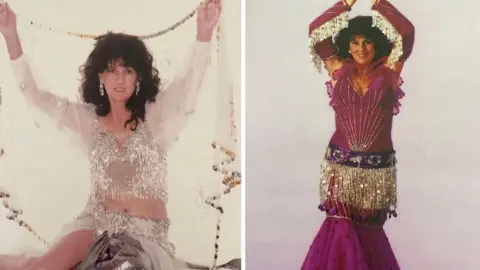 Tina Hobin There are two images of a woman wearing sequin belly dancing outfits. She is posing with her hands above her head.