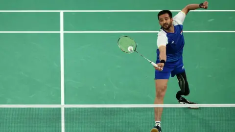 Getty Images Kumar Nitesh of Team India competes during the Para Badminton Men's Singles SL3 Gold medal match on day five of the Paris 2024 Summer Paralympic Games at Porte de La Chapelle Arena on September 02, 2024 in Paris, France. 