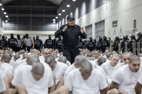 Deportees inside a prison in El Salvador