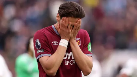 Konstantinos Mavropanos of West Ham United looks dejected
