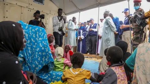 WHO WHO director-generalTedros Adhanom Ghebreyesus (centre in background) during a visit to a camp for Sudanese refugees Adré in Chad on the border with Sudan