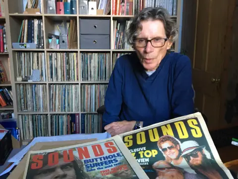 Hugh Fielder Hugh Fielder with copies of Sounds weekly music paper