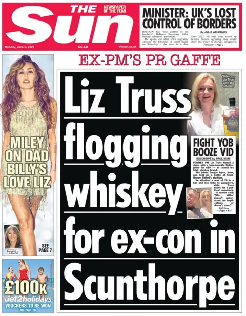 The front page of the Sun shows a picture of Miley Cyrus with the headline: Miley on Dad Billy's love Liz (a picture of actress Elizabeth Hurley is shown below). Beside, a picture of former prime minister Liz Truss is shown, with her appearing to hold an alcohol bottle. The headline reads: Liz Truss flogging whiskey for ex-con in Scunthorpe.