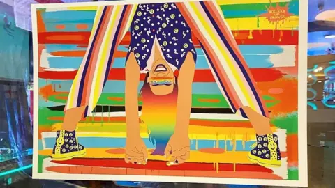 Su Devine/Dale Hardy A vibrant picture in many colours of a woman touching her toes 