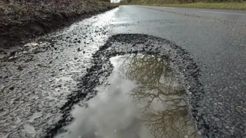 Pothole on rural road