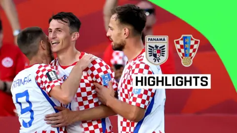 Ante Budimir celebrating with team mates 
