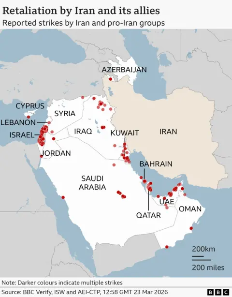A regional map highlighting Iran in white with its name in black. Countries that have come under fire from Iran are labelled - Israel, Cyprus, Lebanon, Iraq, Kuwait, Jordan, Bahrain, Qatar, UAE, Oman, Saudi Arabia, Azerbaijan, Syria. Surrounding countries are grey.