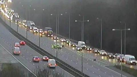 CCTV camera of the Junction 22 M1 showing multiple vehicles stood in traffic