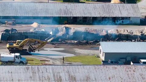 Getty Images A fire killed at least 17 horses at a barn on Nelson Avenue used by trainers at the nearby harness track on Tuesday, June 16, 2026, in Saratoga, NY. 

