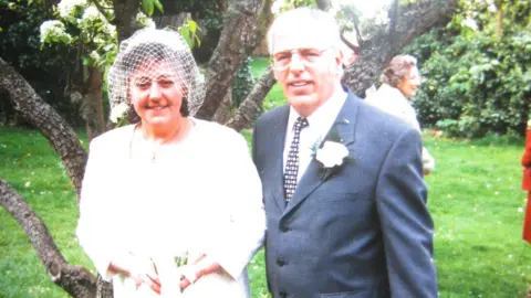 HANDOUT Tony Maund with his wife 