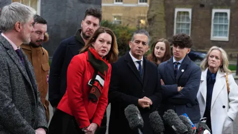 PA Media Bereaved families of the Nottingham attacks