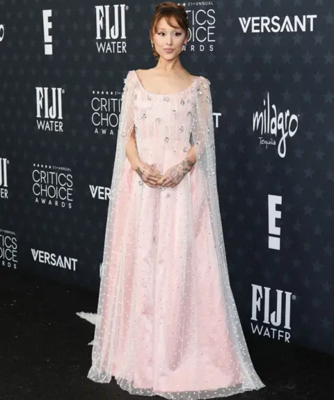 Getty Images Ariana Grande arrives at the 31st Annual Critics Choice Awards at Barker Hangar on January 04, 2026 in Santa Monica, California