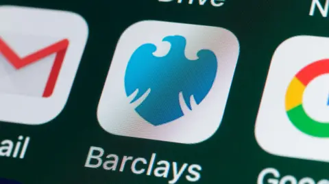 Getty Images A phone screen with a Barclays logo