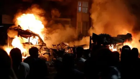 Riots sparked in Harehills and a bus was torched in July last year 