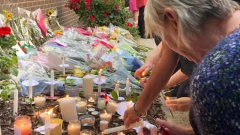 Bouquets and candles have been left in the days since the attack