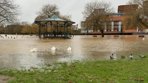 A bandstand used by the Royal Shakespeare Company was surrounded by deepening flood water