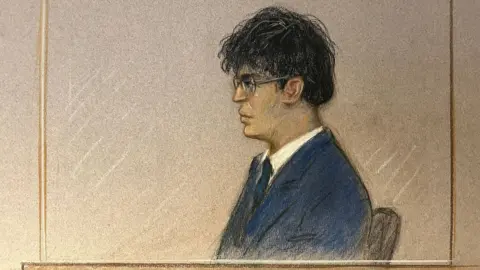 BBC/Julia Quenzler Side on court sketch of Zhenhao Zou, a man with black hair wearing a blue suit, white shirt and blue tie, sitting in the dock behind glass panels