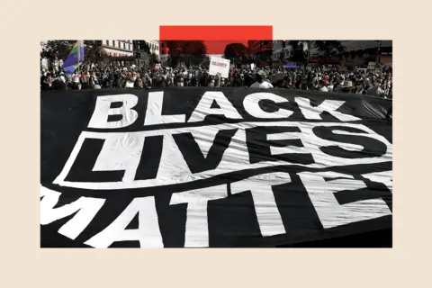 Getty Images Demonstrators deploy a "Black Lives Matter" banner near the White House