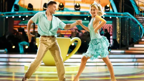 Tasha Ghouri and Aljaz Skorjanec, during their quality  connected  the unrecorded  amusement   connected  Saturday for BBC1's Strictly Come Dancing.