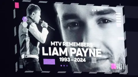 Getty Images A screen with two black and white photos of Liam Payne and the words "MTV remembers Liam Payne 1993-2024"