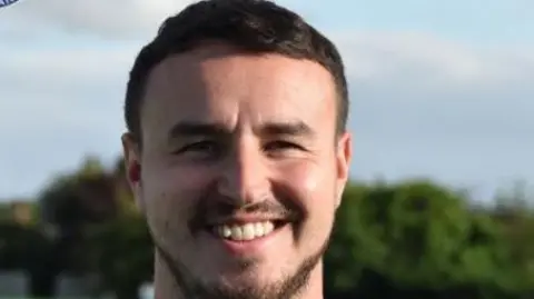 An image, released by Barton Town FC, showing James Hitchcock smiling.