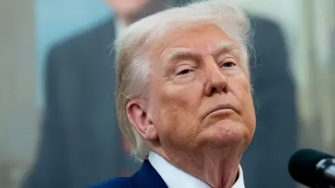 US President Donald Trump talking at a press conference 