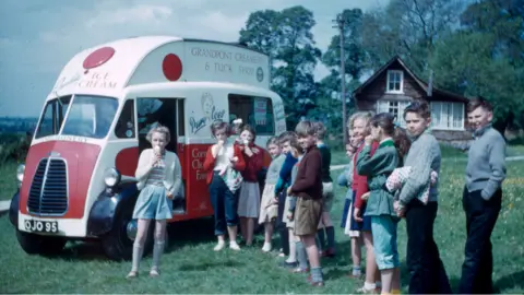Hill End An archive image from the 60s shows children lining up waiting to be served at a red and white ice cream van.