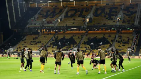 Reuters Wolverhampton Wanderers players during the warm up before the match at Molineux Stadium