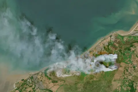 EU/ESA/Copernicus A satellite image on Sunday of the plume of smoke from the fire on Conwy Mountain and around the Sychnant Pass
