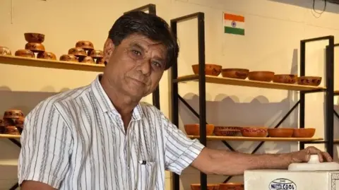 Mansukh Prajapati Mansukh Prajapati with clay ceramics in the background