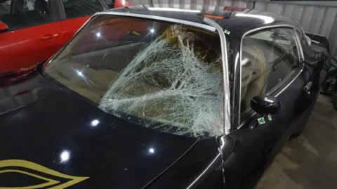 Rutland and North Leicestershire Coroner's Court Brandon Beesla's car, a Pontiac Firebird, shows a shattered windscreen.