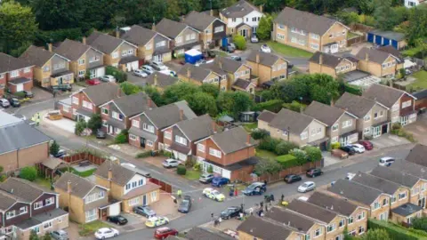 PA Aerial view of the Ashlyn Close scene, Bushey, Hertfordshire