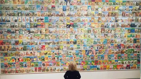 Ladybirdflyawayhome A child looking at about 500 Ladybird books