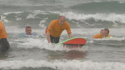 Ed Davery surfing