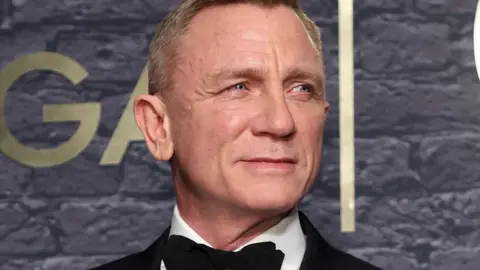 Getty Images Daniel Craig in a suit as James Bond 