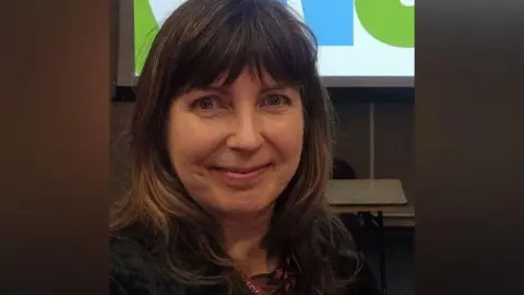 Lea Bevan Lea Bevan smiling