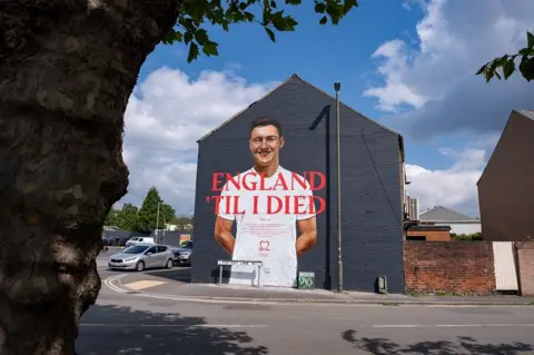 British Heart Foundation Mural shows Tom Henson who died from cardiac arrest