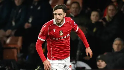 Ryan Barnett in action for Wrexham during the 2025-26 season