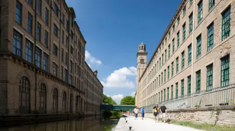 The canal running alongside Salt's Mill in Saltaire