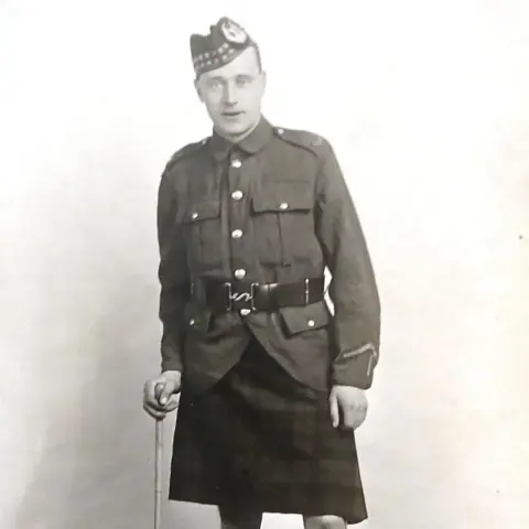 MacFarlane family Private Duncan MacFarlane wearing his Gordon Highlanders military uniform including a thick black belt and a cap