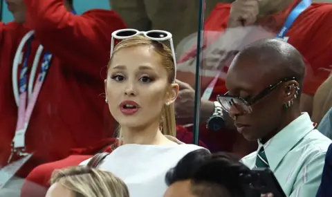 Getty Images  (L-R) Ariana Grande and Cynthia Erivo attend the Artistic Gymnastics Women's Qualification 