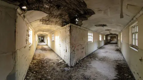 Sam Dawson A view down two brick-lined tunnels underneath the Deepdene Hotel.