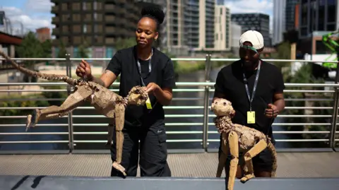 EPA Puppeteers in central Manchester before the parade