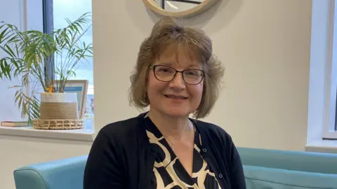 North Bristol NHS Trust A woman smiling 