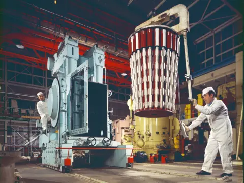 Courtesy Nuclear Restoration Services Men working in the Chapelcross plant