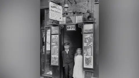 Ripley and District Heritage Trust A black and white image showing two people standing in the entrance to the former zoo