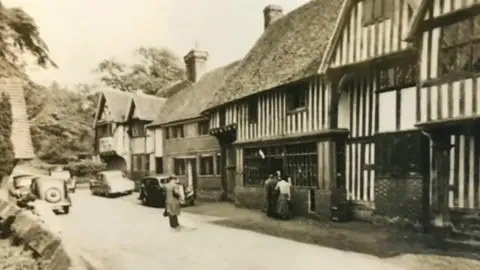 An old, black and white photo of Chiddingstone dating back to the beginning of the 20th century