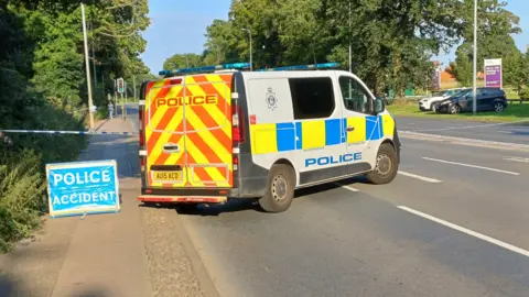 A police van on Dereham Road